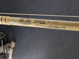 Dawa fishing pole with okuma reel