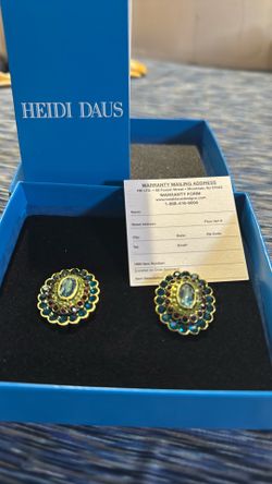 Heidi Daus 🆕”Collector’s Edition omega earrings Swarovski Crystals