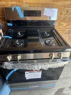 Brand New GE 30 inch stove, gas range