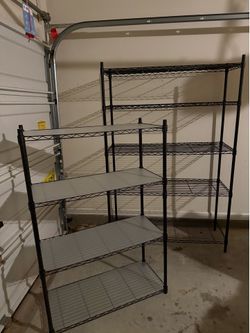 Two black wire shelving unit $50