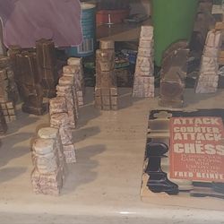 Marble Chess Pieces and Book