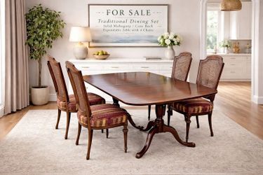 Classic vintage dining table and four cane-back chairs