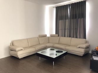 Natuzzi Beige LEATHER Sectional w/ adjustable headrests