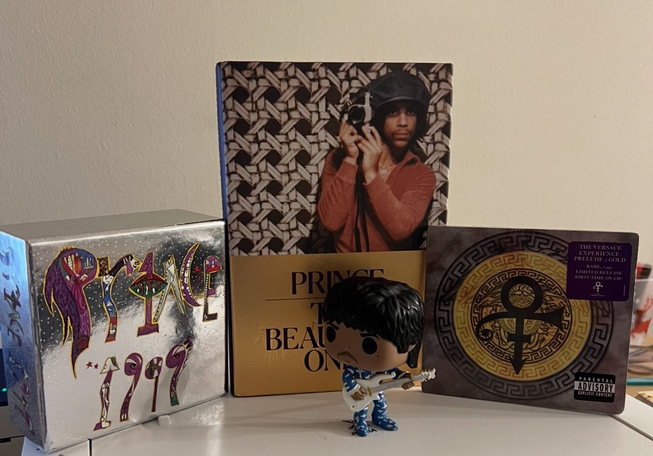 PRINCE -BOOK,ALBUMS AND figure