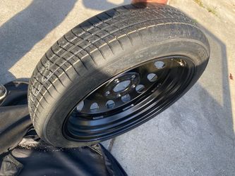 Spare rim with tire (new)
