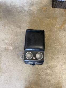 Lighted rear center console cup holders