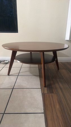 Round wood coffee table