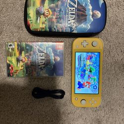 Switch Lite + 2 Games (hablo Espanol)