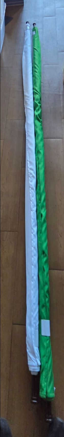 Green and white roll-up backdrop