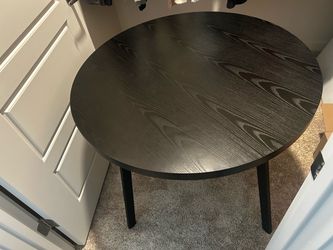 Round Dark Wood Dining Table