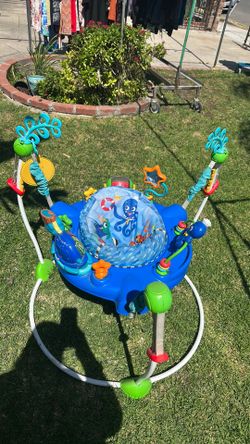 Baby Einstein jumper  needs light cleaning