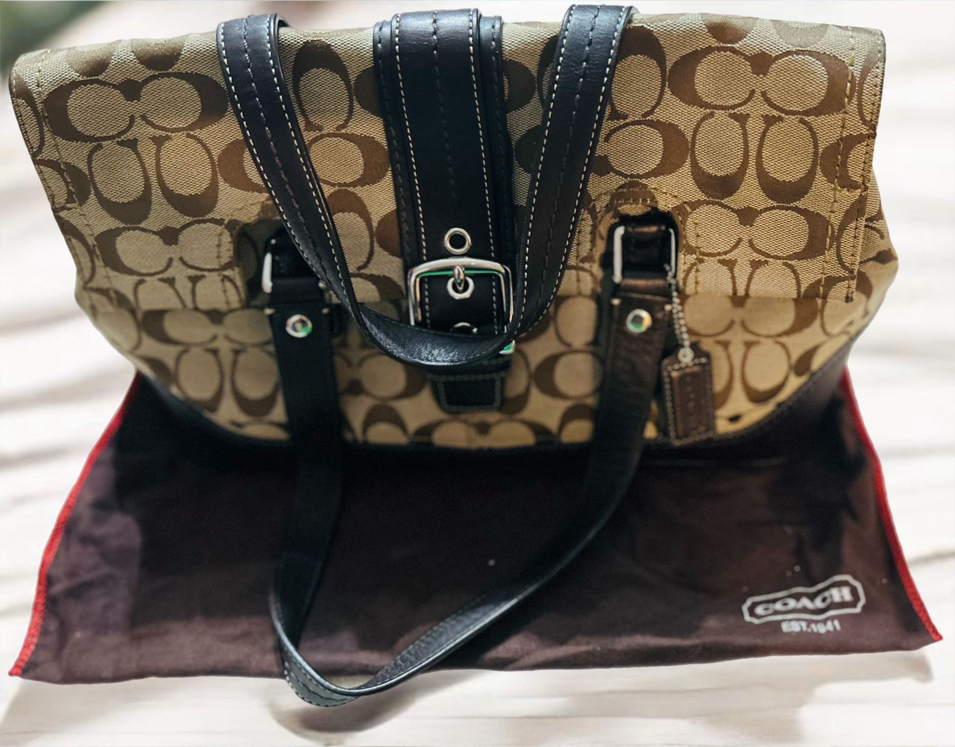 brown satchel Coach purse