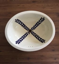 Oval Handpainted Sinks with matching Tile
