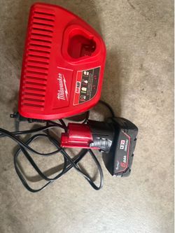 Milwaukee battery and charger