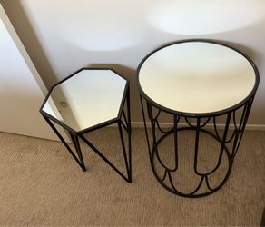 2 black mirror side tables