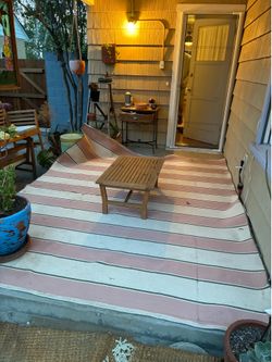 Outdoor pink/green/white rug