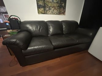 Black Couch, Chair, And Ottoman