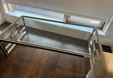Modern rectangular chrome and glass coffee table 