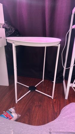 Small round metal side table with removable tray