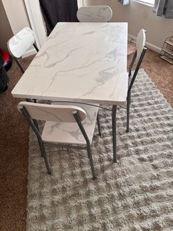 Dining table and chairs