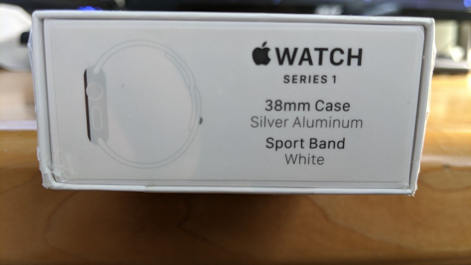 Apple watch series 1 (38mm) Silver aluminum case with white sport band. Unopened. Brand new.