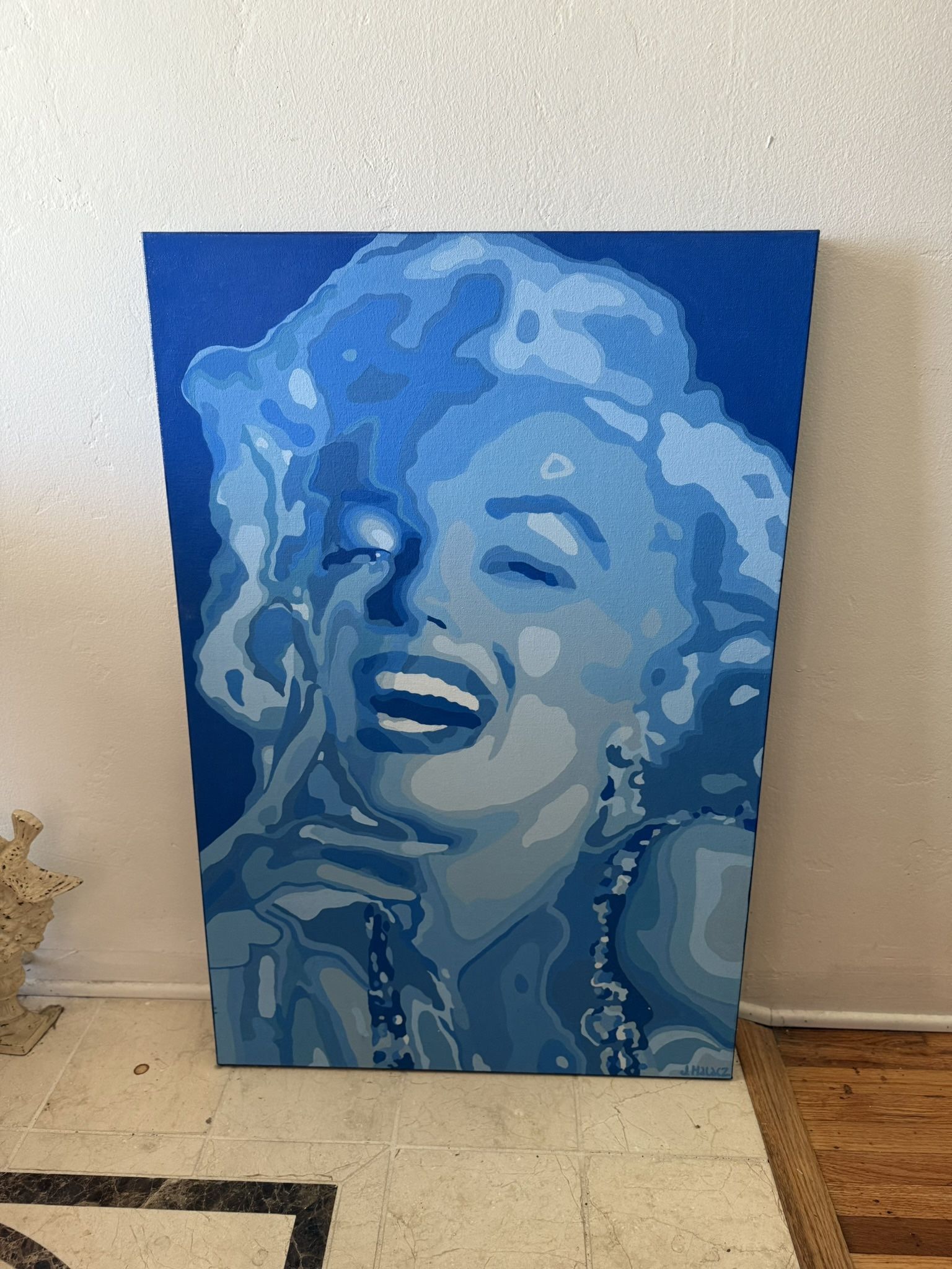 PAINTING “MARILYN IN BLUE” BY JAMES HALACZ MEASUREMENTS ARE 24” X 36 1/2 “ A REAL STATEMENT PIECE LIGHTING GIVES IT A DRAMATIC EFFECT!
