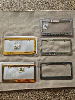 "Mercedes" (3) and Solid Brass (2) license plate frames