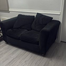 2 seater black couch