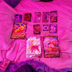 Pokemon Trading Cards And Card Protectors