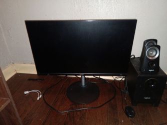 Acer monitor with Logitech speakers and subwoofer