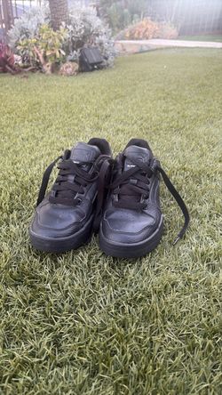 Puma All-Black Low-Top Leather Sneakers