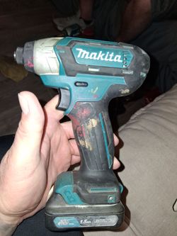 Makita 12 V impact drill with battery...
