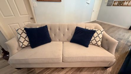 Beige Tufted Sofa with Nailhead Trim
