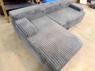 Gray upholdered two piece boneless sectional sofa couch