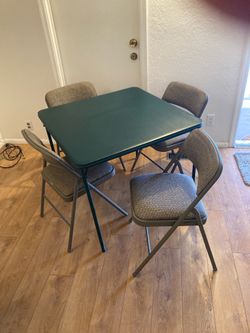 CARD TABLE AND FOUR UPHOLSTERED FOLDING CHAIRS
