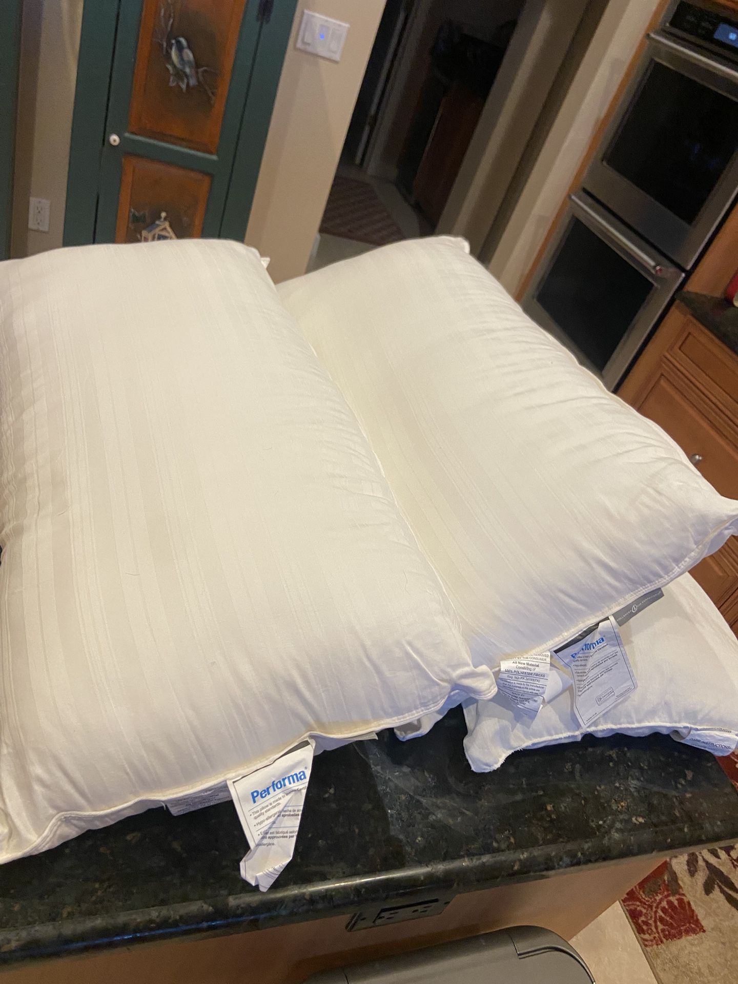 Three King Size Pillows 2 Performa Brand, 1 Unbranded
