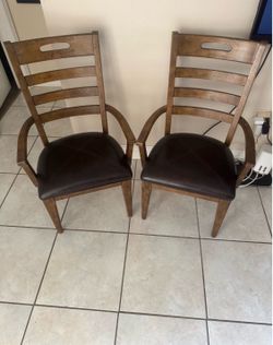 Pair Of Solid Wood Arm Chairs