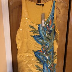 Size Large Sleeveless Top For Ladies.$12 Or Two For $20 .so Many Different Ones And I Have Sizes Small ,medium,large Ladies Tops And Pants