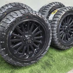 NEW 20x9.5 gloss black wheels wrapped in 31x11.50r20 rbp tires