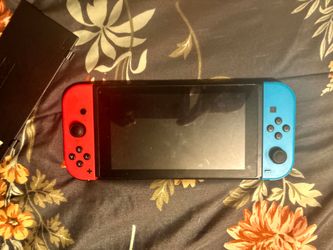 Nintendo Switch with Neon Red and Blue Joy-Cons