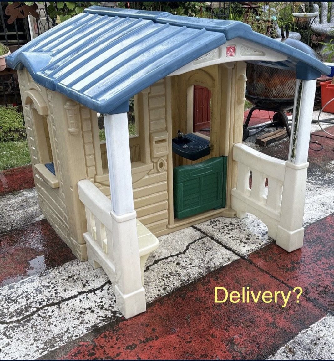 Step2 Naturally Playful Front Porch Playhouse