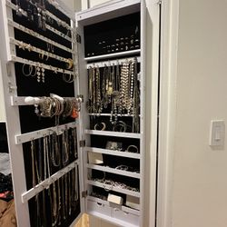 Jewelry storage mirror