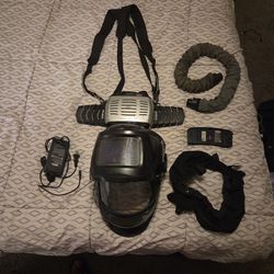 Lincoln Viking Welding Helmet with 1 Battery, 1 Charger, 1 Respiratory Unit, 1 Hose 1 Cotton Helmet Guard, And Helmet