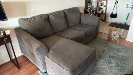 Dark grey  couch with chaise in good condition