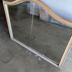 Old mirror frame.  34x28 (at tallest point ) Needs new mirror.  Has an outer frame  that it can attach to if desired.