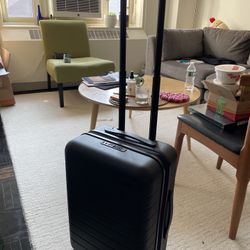 Away Carryon Flex Black Rolling Suitcase with TSA Lock