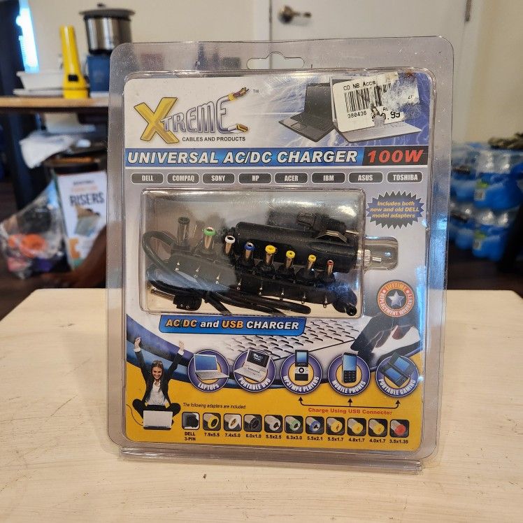 new in box Xtreme Cables and Products 100W Universal AC/DC Charger.