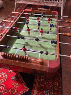 Foosball Table with grass-like platform