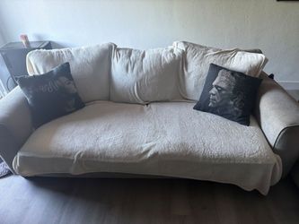 Matching sofa and love seat.