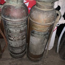 4 antique Fire extinguishers
